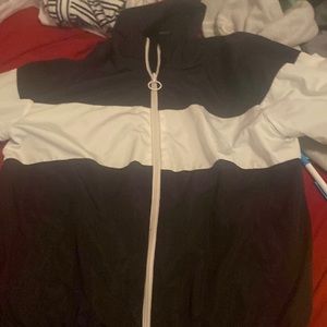 A black and white zipped up hoodie